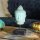 Dekostatue Buddhakopf 30 cm hoch Beton Holz in Grün Kupfer